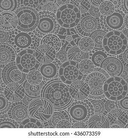 Seamless pattern of hand-drawn and painted mandalas. Vector graphics. Monochrome gamma .