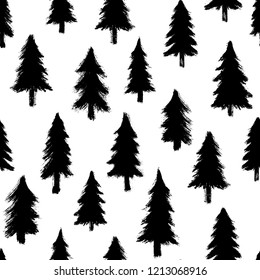 Seamless pattern with hand-drawn pine trees isolated on white background. Christmas forest wallpaper. Doodle style grunge shapes.