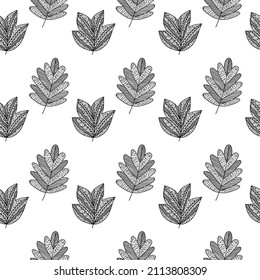 Seamless pattern of hand-drawn plant branches and leaves. Vector floral doodle style for background, textile, design.