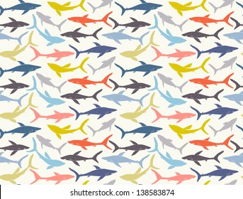 Seamless pattern of hand-drawn sharks silhouettes. EPS 10 vector