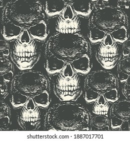 Seamless pattern with hand-drawn sinister human skulls. Dark vector background with scary skulls. Graphic print for clothes, fabric, wallpaper, wrapping paper, design element for halloween party