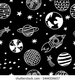 Seamless pattern with hand-drawn space elements on a black background. Doodle style. Vector illustration. 