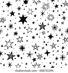 Seamless pattern with handdrawn stars. Doodle monochrome vector illustration.