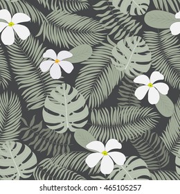 Seamless pattern with hand-drawn tropical leaves and flowers