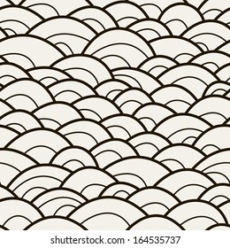 Seamless pattern with hand-drawn waves. Creative abstract background. Stylized scale texture