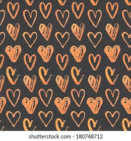 Seamless pattern of hand-painted  hearts on a grungy background
