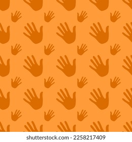 Seamless pattern handprints, isolated on orange background.