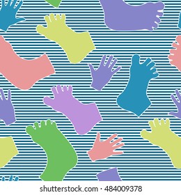 Seamless pattern with hands and feet. Striped background.