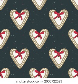 Seamless pattern of happy Christmas gingerbread cookies with white frosting in the shape of a heart with a red bow. Bright festive background. New Year sweets.