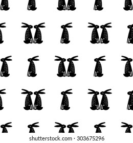 Seamless pattern with hares. Graphic hand drawn background.