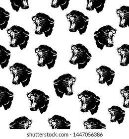 Seamless pattern, head of aggressive angry panther, black silhouette on white background, vector