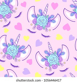 Seamless pattern with head of unicorn on pink background