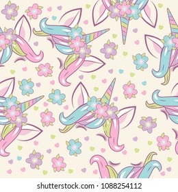 Seamless pattern with head of unicorn on beige background