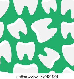 Seamless pattern with healthy bleached teeth on the green background. Dental concept.