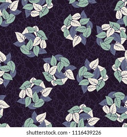 Seamless pattern. Heaps of fallen leaves arranged in random order. Multi-colored texture. The background is a ligature from the contours of the seven-pointed stars.