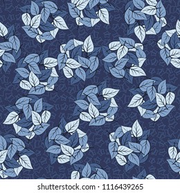 Seamless pattern. Heaps of fallen leaves arranged in random order. Multi-colored texture. The background is a scattering of halves of five-pointed stars.