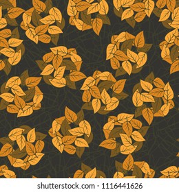 Seamless pattern. Heaps of fallen leaves arranged in random order. Multi-colored texture. The background is a lattice of contours of broken pentagons.