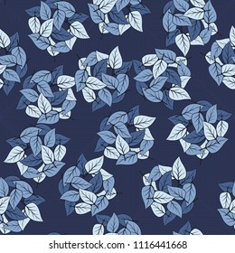 Seamless pattern. Heaps of fallen leaves arranged in random order. Multi-colored texture. The background is a large concentric squares of fine lines.