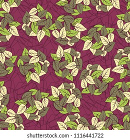 Seamless pattern. Heaps of fallen leaves arranged in random order. Multi-colored texture. The background is a lattice of contours of broken pentagons.
