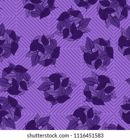 Seamless pattern. Heaps of fallen leaves arranged in random order. Multi-colored texture. The background is a grid of squares, which consist of diagonal lines.