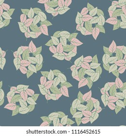 Seamless pattern. Heaps of fallen leaves arranged in random order. Multi-colored texture.