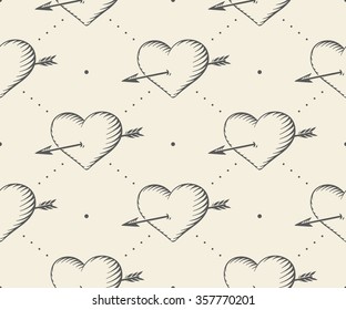 Seamless pattern with heart and arrow in vintage style engraving on a beige background for Valentine's Day. Hand drawn. Vector Illustration