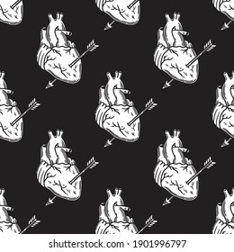 seamless pattern of the heart organ with an arrow on black background.