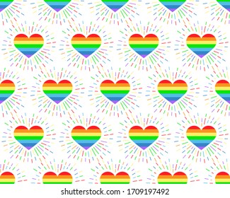 Seamless pattern. Heart with rays rainbow color. Vector illustration of striped heart on white background for holiday designs, greeting cards, holiday prints, designer packaging, stylish textile, etc.