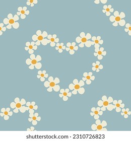 Seamless pattern with heart shape with flowers of daisy flowers in Groovy style on a blue background