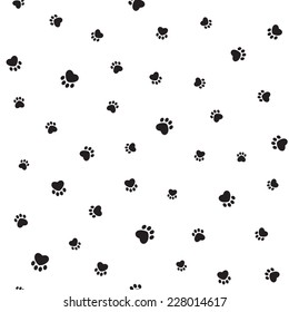 Seamless pattern with heart shaped animal footprints