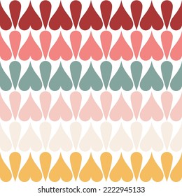 Seamless pattern with hearts arranged in beautiful colors.