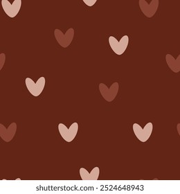 Seamless pattern with hearts in autumn colors. Many hearts on a chocolate background. A cozy seamless heart pattern for textiles, printing, and gift product design