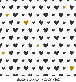 Seamless pattern with hearts in black and golden.
