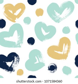 Seamless pattern with hearts in blue, green and gold colors. 