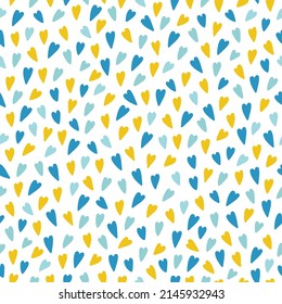 Seamless pattern with hearts in blue and yellow colors. Perfect for support Ukraine, wallpaper, wrapping paper, background, fabric. Vector illustration