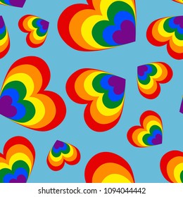 A seamless pattern of hearts in the colors of an LGBT community on a blue background