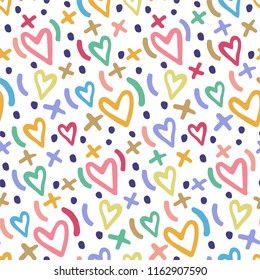 Seamless pattern of hearts, dots and signs.