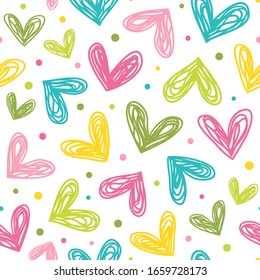 Seamless pattern with hearts and dots. Vector background in doodle style.