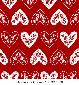 Seamless pattern of hearts with ethnic branch. Hearts pattern on white background. Seamless pattern with ethnic style hearts. Scandinavian folk ornament on red background