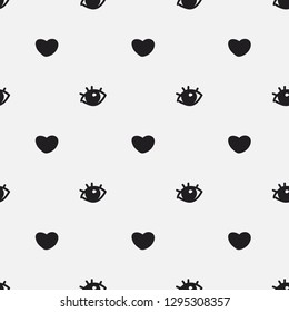 Seamless pattern with hearts and eyes. Pretty vector illustration in black and white. Valentine's Day, Mother's Day or Women's Day concept background. Repeated backdrop for any use.