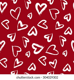 Seamless pattern with hearts. Hand drawn background.