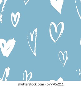 Seamless pattern with hearts. Hand drawn vector illustration. Decorative elements for design. Creative art work