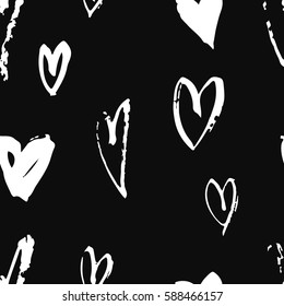 Seamless pattern with hearts. Hand drawn vector illustration. Decorative elements for design. Creative art work