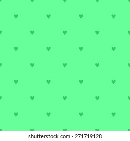 Seamless pattern with hearts hand-drawn style polka dot green on light green background