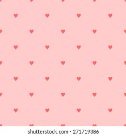 Seamless pattern with hearts hand-drawn style polka dot red coral on a light pale coral background