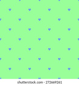 Seamless pattern with hearts hand-drawn style polka dot blue on a light green background