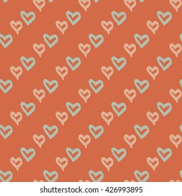 Seamless pattern with hearts. Ink and brush. Hand painted background.