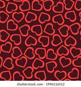 Patrón sin foco de corazones en un fondo oscuro. Impresión para embalaje de regalo e impresión de ropa. Vector.