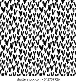 Seamless pattern with hearts. Ornament for Valentine's day. Ink illustration. Isolated on white background. Brush strokes. 