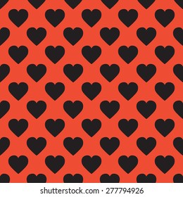 Seamless pattern of hearts in pastel colors.